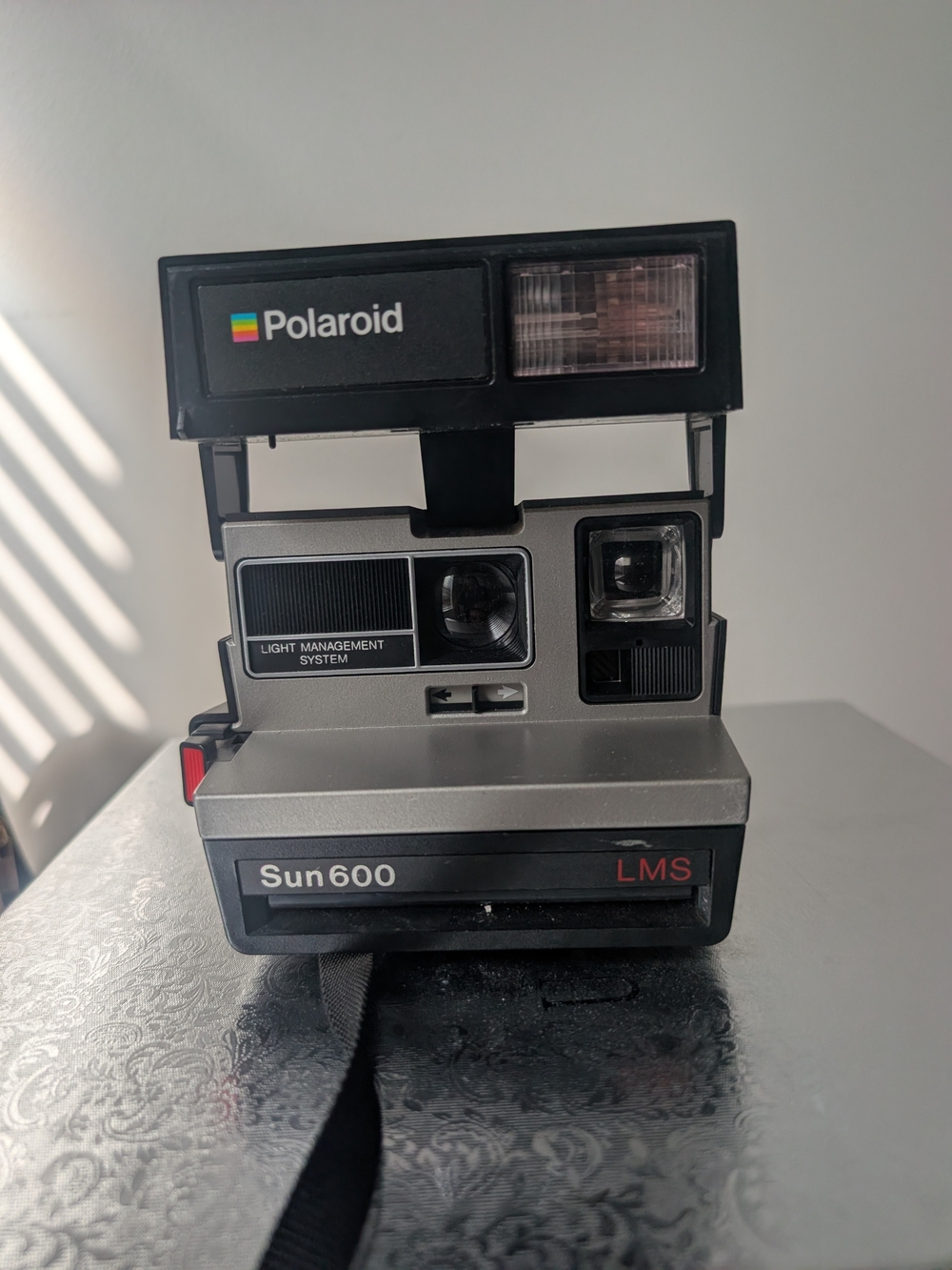 Polaroid Sun 600 LMS Instant Camera — Silver & Black